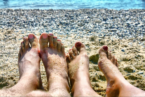 stock image Legs on sand of marine beach