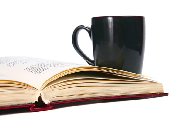 Open boek en cup — Stockfoto