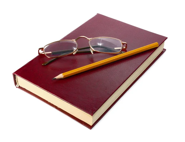 Kniha je brýle a tužka — Stock fotografie