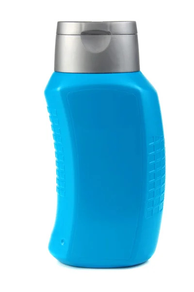 Синя пляшка для шампуню — стокове фото