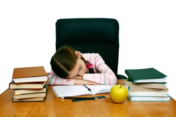 Stock image Girl is asleep at the writing table with books isolated on white background