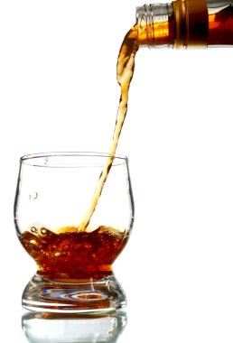 Alcohol drink pouring into glass clipart