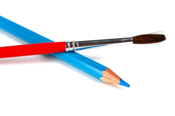 Lápis azuis e pincel para tintas — Fotografia de Stock