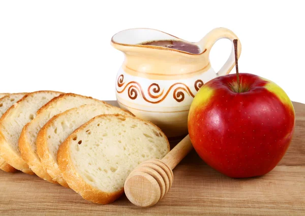 Miel en una jarra y pastel de manzana a bordo —  Fotos de Stock