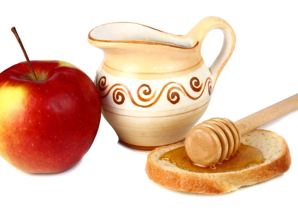 Μέλι σε μια κανάτα και μήλο — Φωτογραφία Αρχείου
