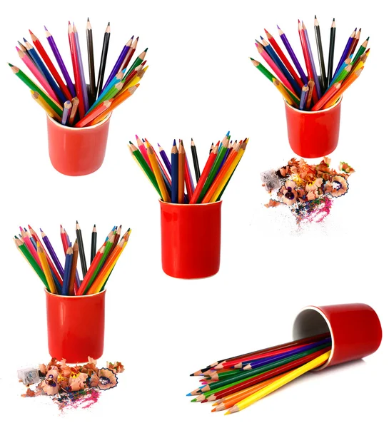 Os lápis coloridos são em vidro vermelho — Fotografia de Stock