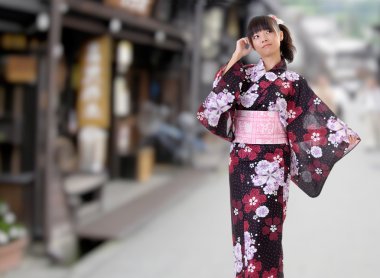 Japanese girl walking on street clipart