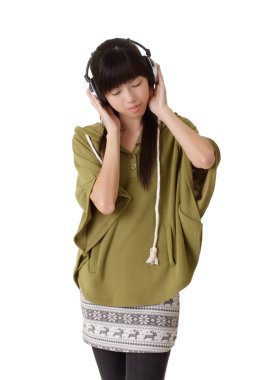 Young lady listening music clipart