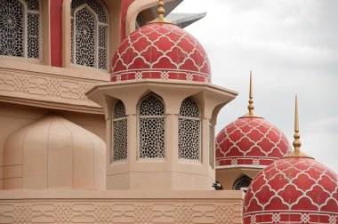 Architecture of mosque with red doom of roof. clipart