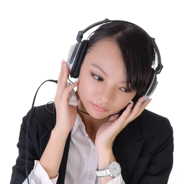 Podnikání žena poslouchat mp3 — Stock fotografie