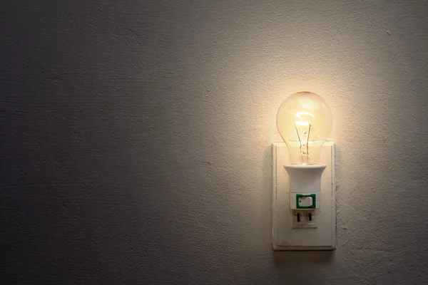 Weak light bulb — Stock Photo, Image