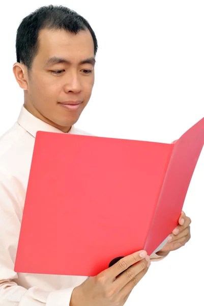 stock image Mature Asian executive reading paper