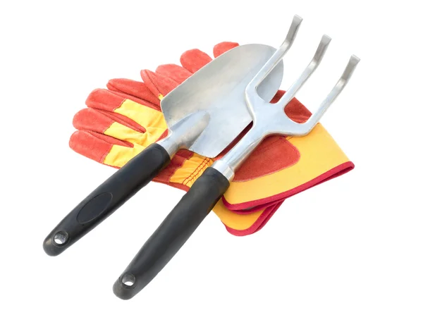 Γάντια και εργαλείο πάνω σε άσπρο — Stock fotografie