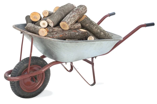 Firewood in an old wheelbarrow — Stock Photo, Image