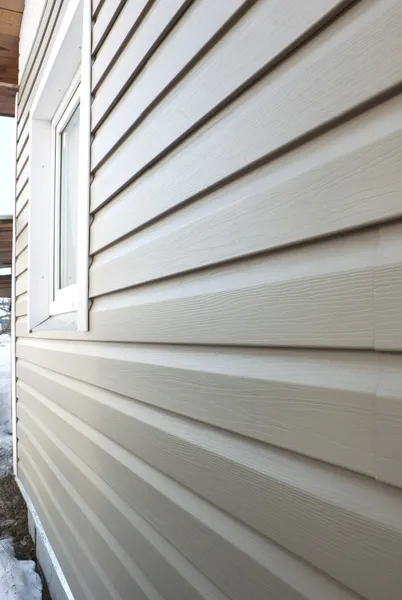 Wall finished in vinyl siding — Stock Photo, Image