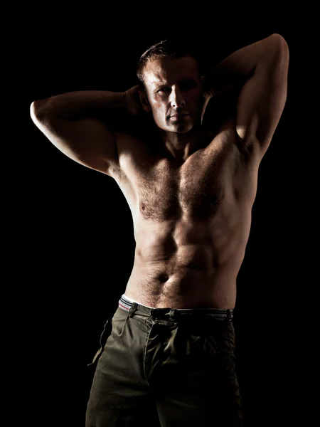 Pohledný muž svalů — Stock fotografie