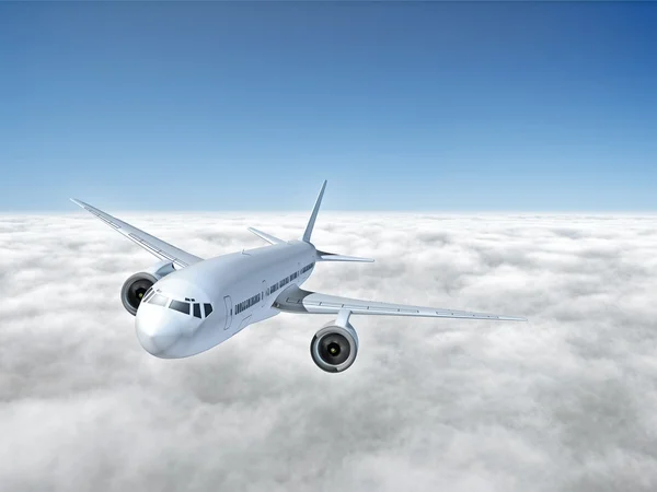 Самолет над облаками — стоковое фото
