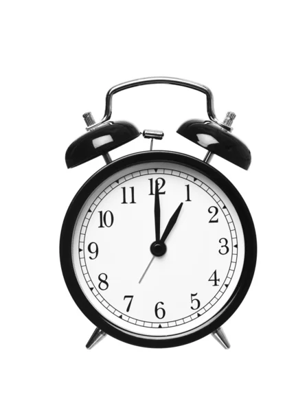 Alarm clock shows one o`clock Royalty Free Stock Photos