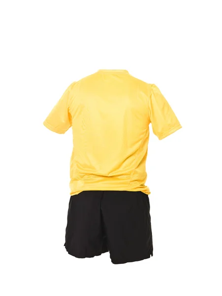 Gelbes Fußballshirt mit schwarzen Shorts — Stockfoto