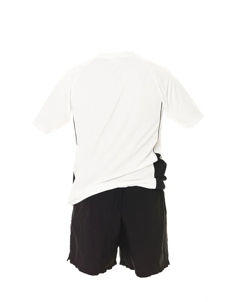 Witte voetbalshirt met zwarte korte broek — Stockfoto