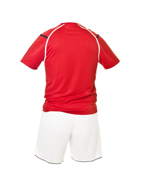 Röd fotbollströja med vita shorts — Stockfoto