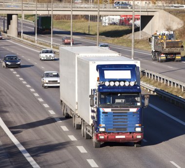 Truck on Highway clipart