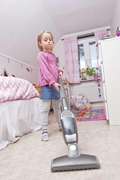 Young Girl with a vacuum cleaner — Stock Photo, Image