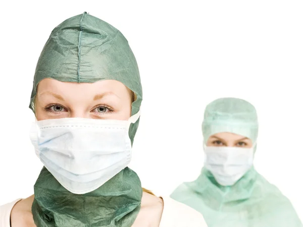 Kızlarla cerrahi maske — Stok fotoğraf