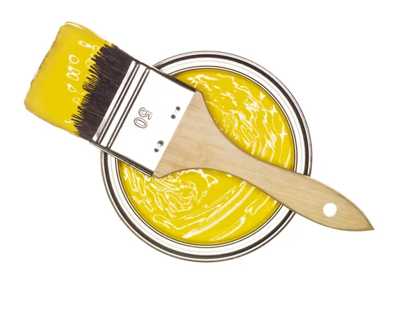 Gele verf kan met borstel — Stockfoto