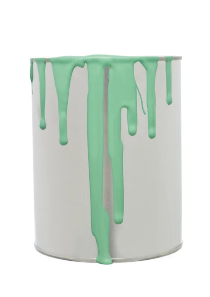 Lata de pintura con derrame verde — Foto de Stock