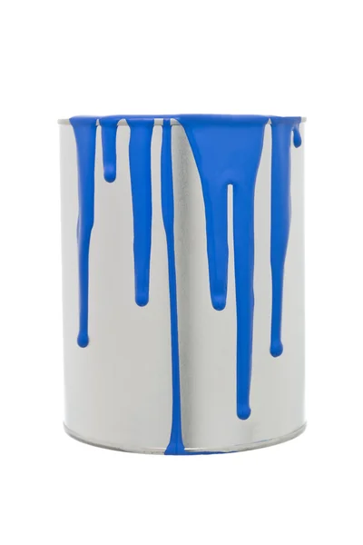 Lata de pintura con derrame azul — Foto de Stock