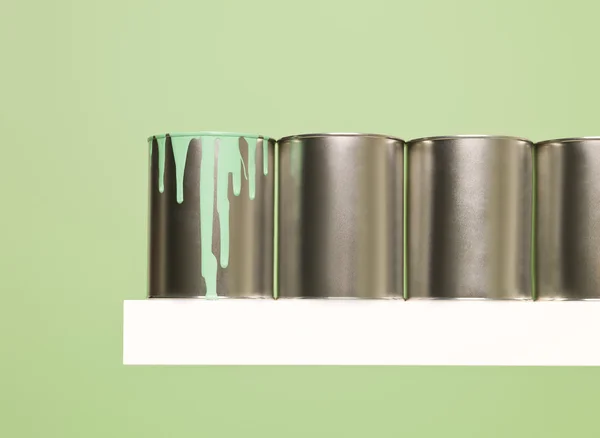 Paintcans in a row — Stock Photo, Image