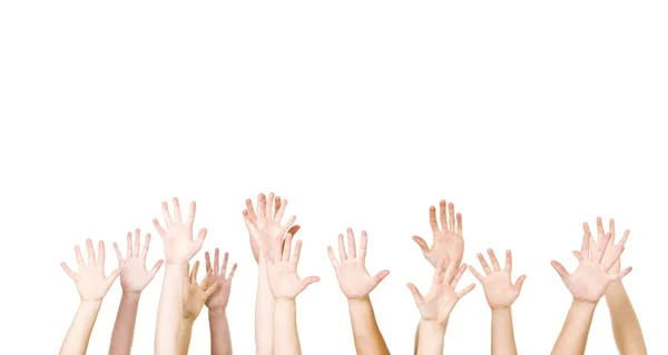 Grupp av händerna i luften — Stockfoto