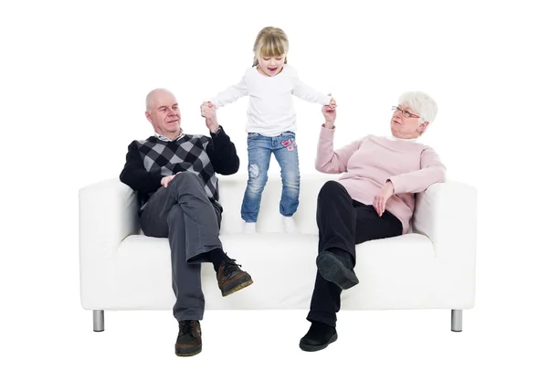 Older couple in a sofa — Stock Photo, Image