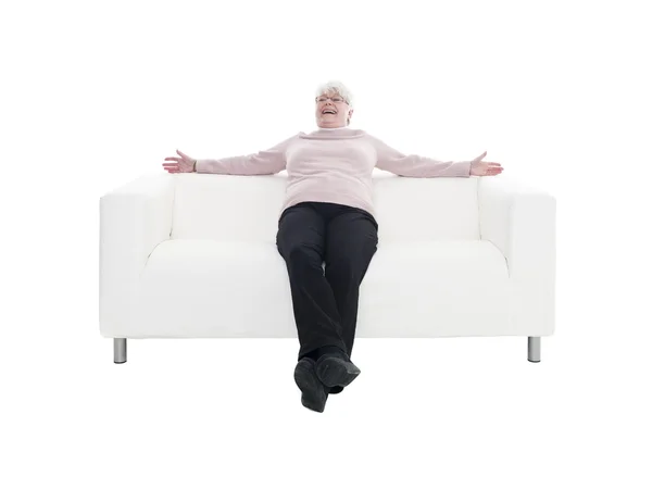 Mujer mayor en un sofá —  Fotos de Stock