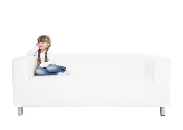 Young girl in a sofa — Stock Photo, Image