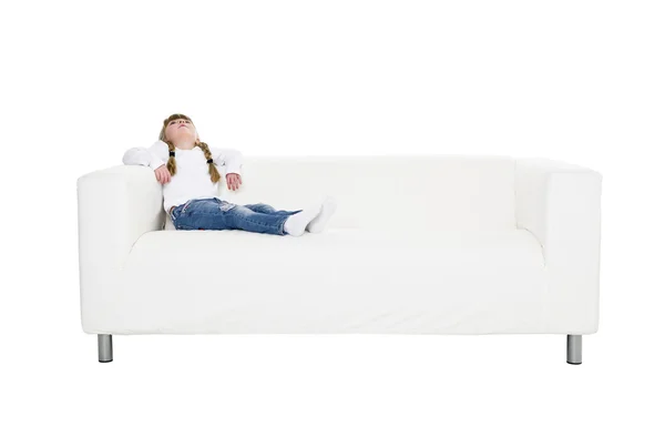 Young girl in a sofa — Stock Photo, Image
