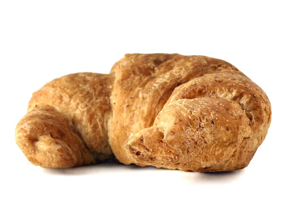 Whole wheat croissant on white — Stock Photo, Image