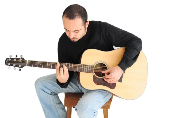 stock image Young man playing the guitar