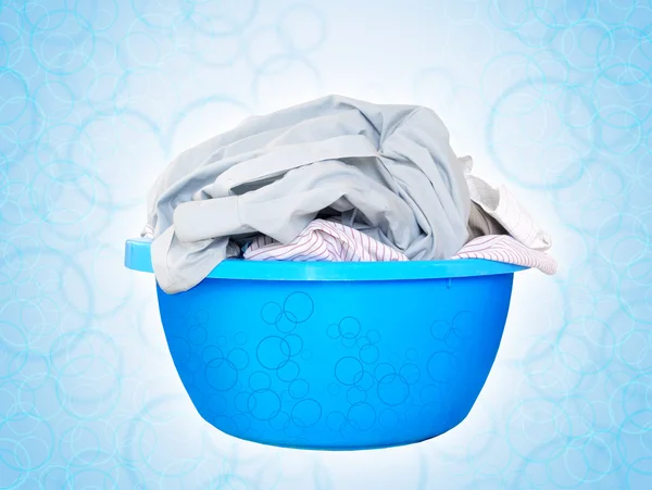 Laundry in blue basin — Stock Photo, Image
