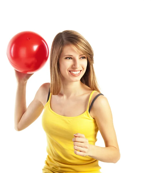体育布举行红球漂亮微笑金发少妇 — 图库照片