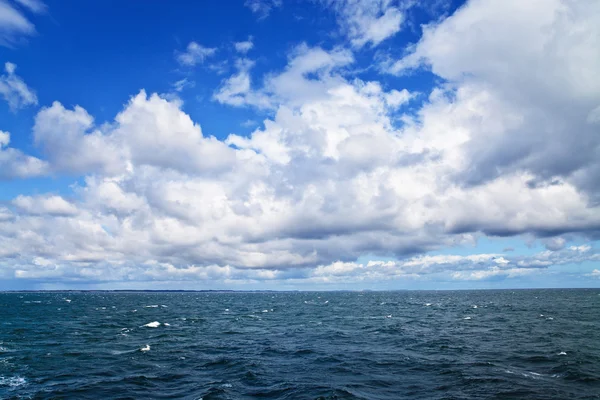 stock image Sea ripples and cloudy sky