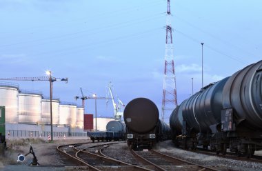 Oil tank cars in twilight clipart