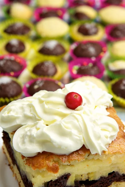 stock image Homemade pie with whipped cream and muffins