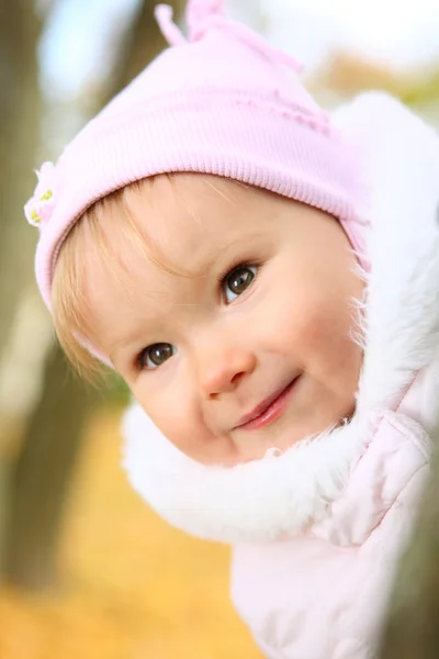 stock image Little emotional girl on the park background