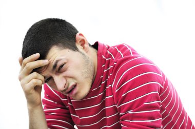 Young man having headache clipart