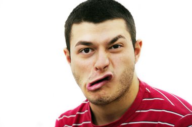 Young man with strange expression oh his face clipart