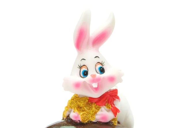 stock image Toy joy rabbit with a red bow, isolated over white