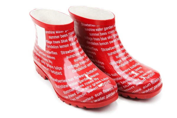Red rubber boots with inscription — Stock Photo, Image