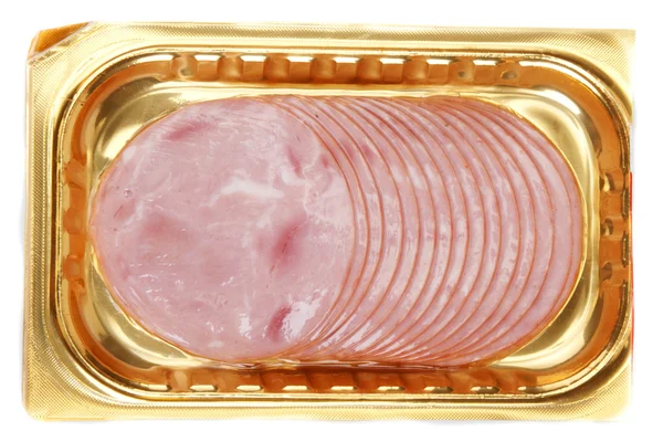 Carne em embalagem dourada — Fotografia de Stock